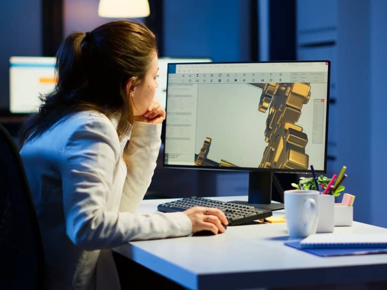 Tired woman architect working on modern cad program overtime